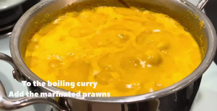Add the marinated prawns and cook for another 10-15 minutes on medium flame.