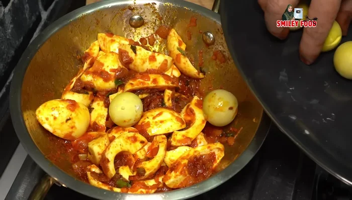 Add the reserved egg yolks, being careful to maintain their shape.