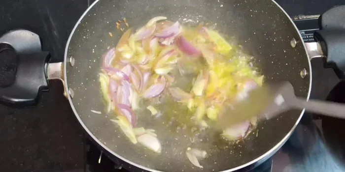 Add the finely chopped onion and saute until soft.