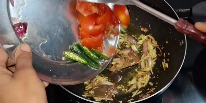 Add tomatoes and green chilies. Mix well. Add salt to taste.