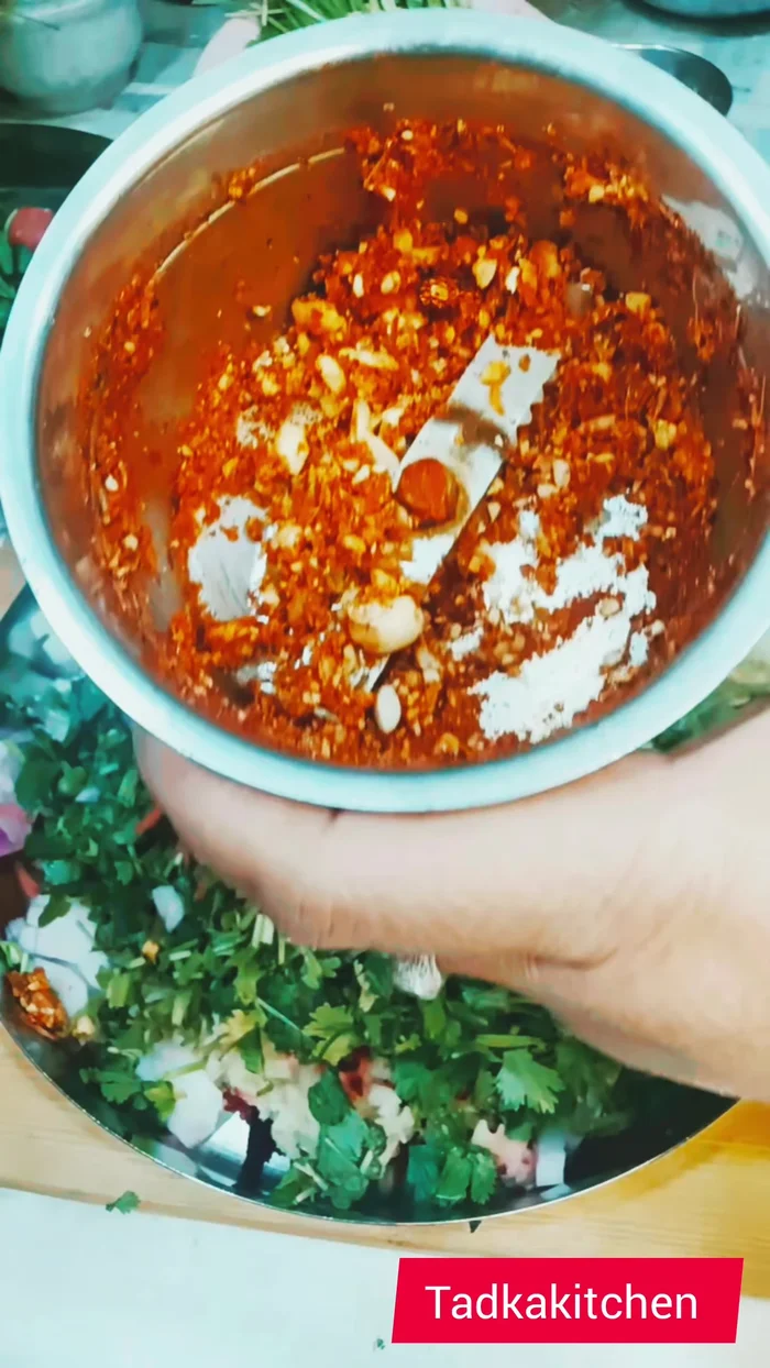Add the spice paste to the vegetable mixture.
