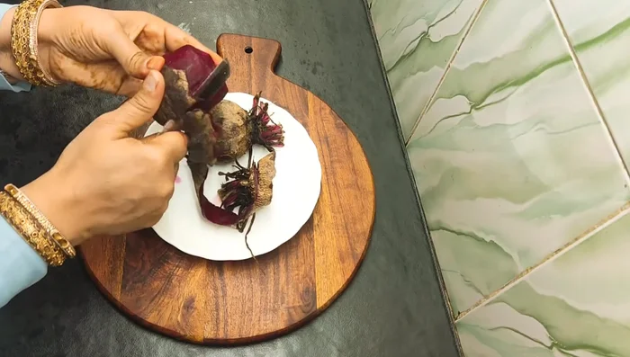 Wash the beetroot slices again after peeling.