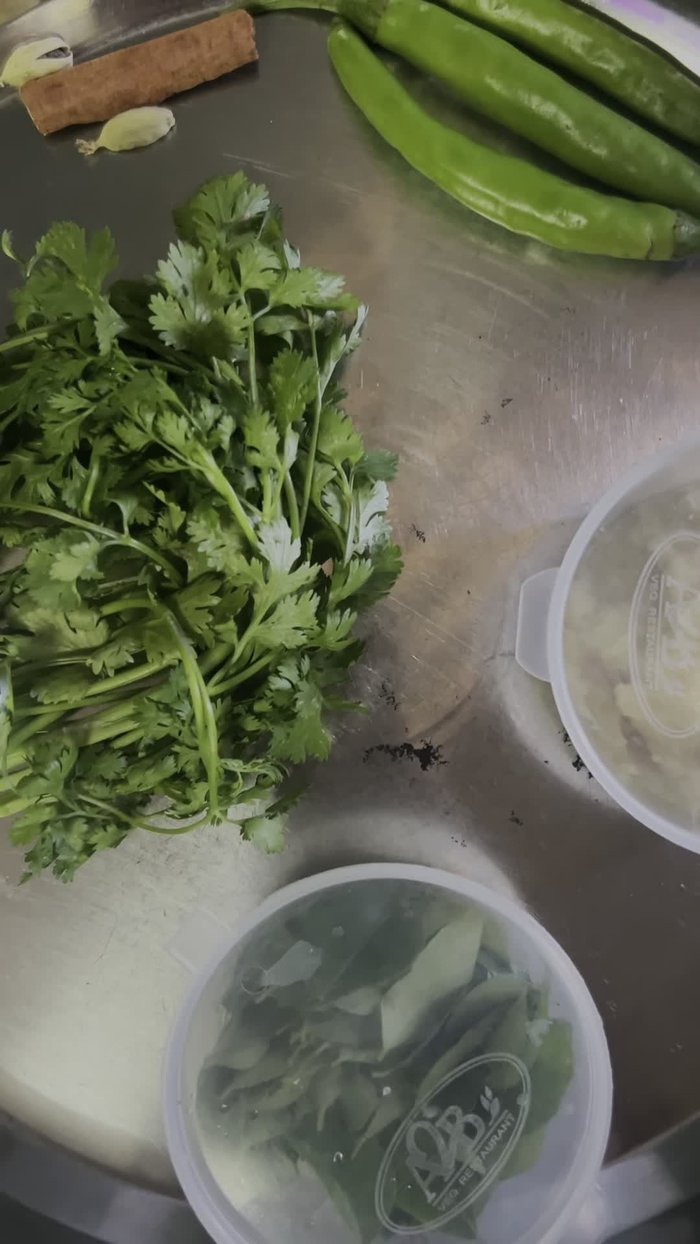 Prepare the spices: cardamom, turmeric powder, chili powder, coriander powder, cumin powder, and garam masala.
