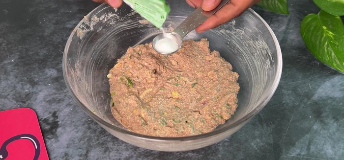 Add Eno fruit salt, mix well in one direction (avoid overmixing).