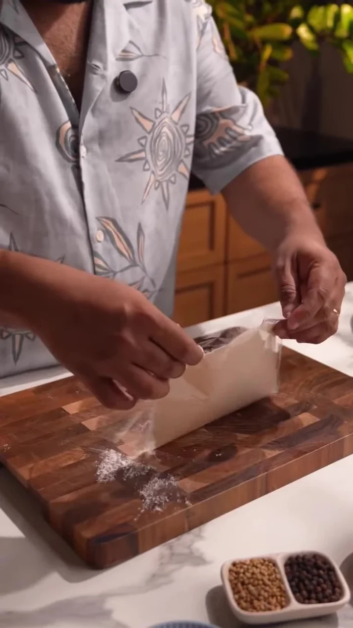 Thaw the frozen puff paratha. It may be sticky, so apply flour to both sides.