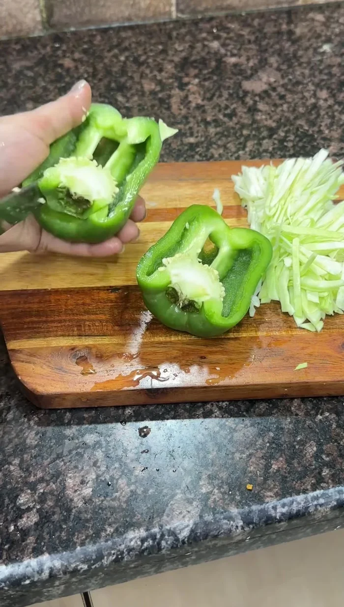 Cut cabbage, capsicum (remove seeds), onion, and tomato (remove pulp) into long, similar-sized pieces.