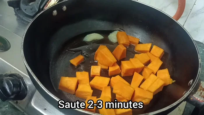 Add the chopped pumpkin and fry for 2-3 minutes.