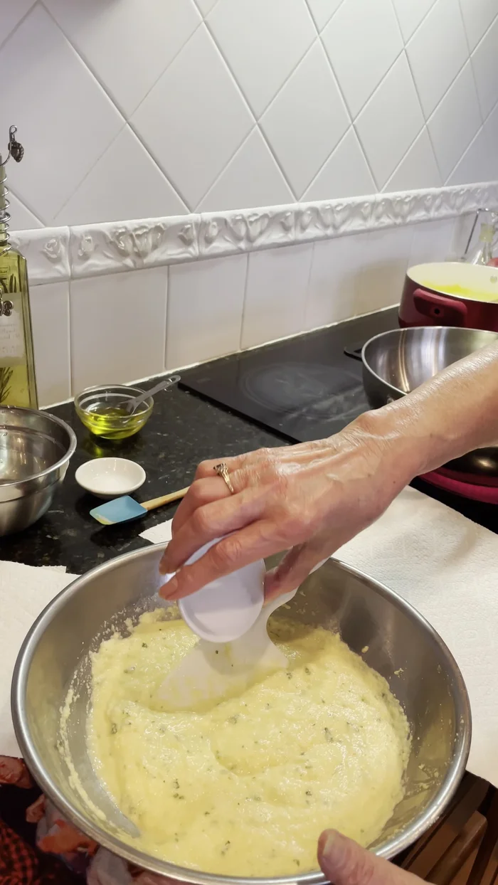 Heat oil in a pan. Fry spoonfuls of the batter until light brown.