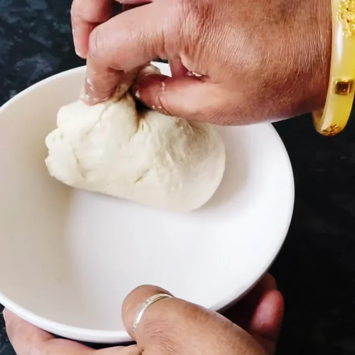 After resting, knead the dough again to make it soft and pliable.
