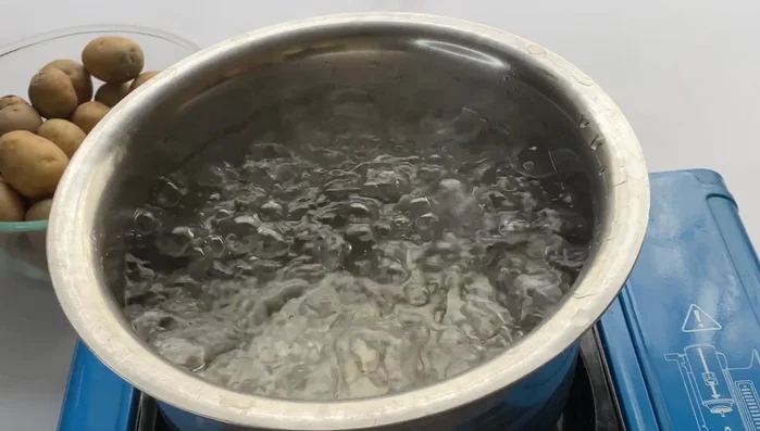 Boil the potatoes in medium flame for 5 minutes until cooked.
