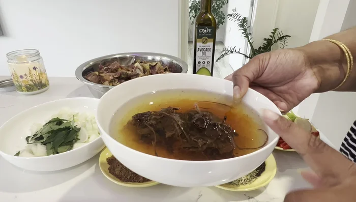 Prepare the tamarind pulp by soaking it in hot water and straining it. Alternatively, soak chopped duck in lemon water, wash with flour to remove gamy smell.
