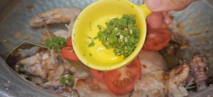 Add tomatoes, green chili paste and cook until tomatoes melt. Add spices (refer to description box for list) and cook until oil separates.