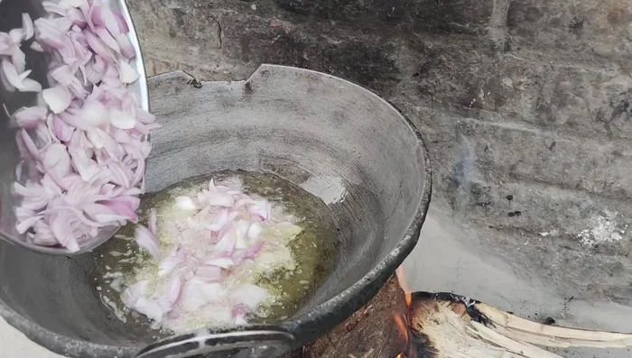 Fry onions until chocolate colored. Remove and set aside.