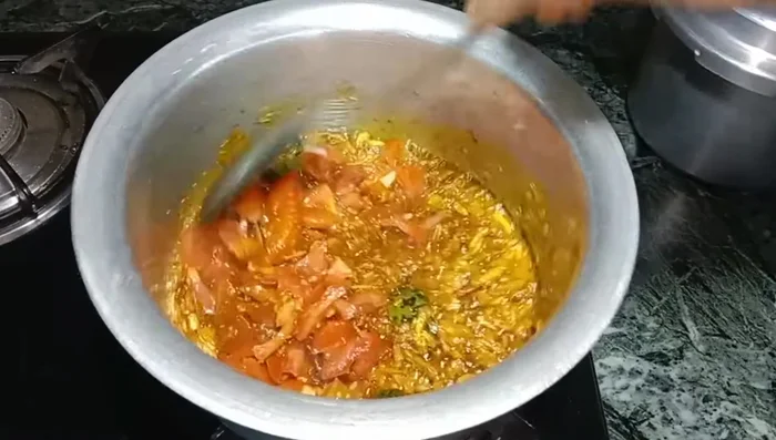 Add finely chopped tomatoes and cook covered for 5-6 minutes on medium flame.