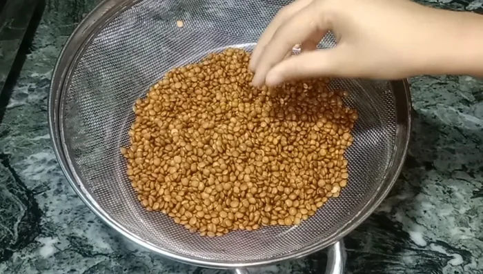 Soak 1 cup of red lentils overnight. Wash thoroughly.