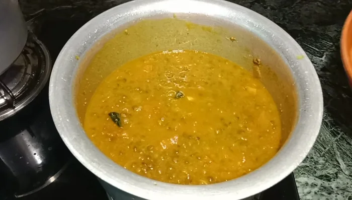 Cook on medium flame until it starts to sizzle, stirring occasionally.