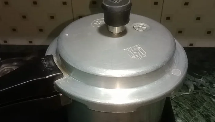 Cook in the pressure cooker on high flame until 2-3 whistles.
