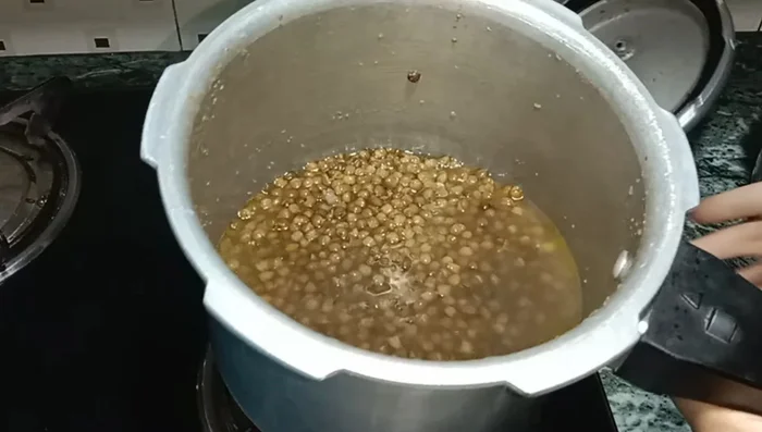 Check if lentils are boiled well. Set aside.
