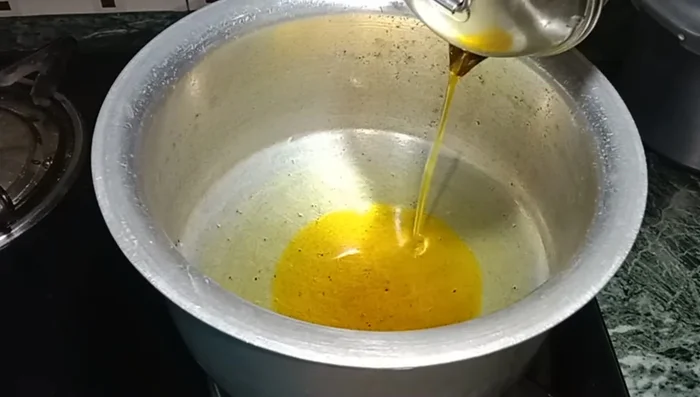 Prepare tadka: Heat 3 spoons of oil in a vessel. Add 1 teaspoon of cumin seeds and sauté until they crackle.