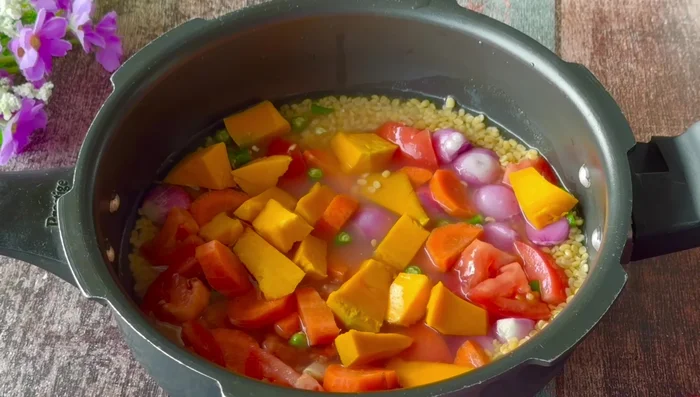 Add chopped parangikay, sambar powder (or turmeric powder), curry leaves, and coriander leaves.