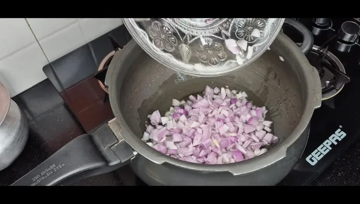 Add finely chopped onions and soften them without burning.