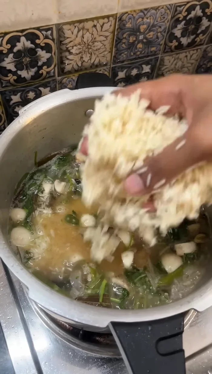 Add soaked basmati rice (soaked for 30 minutes). Mix well.
