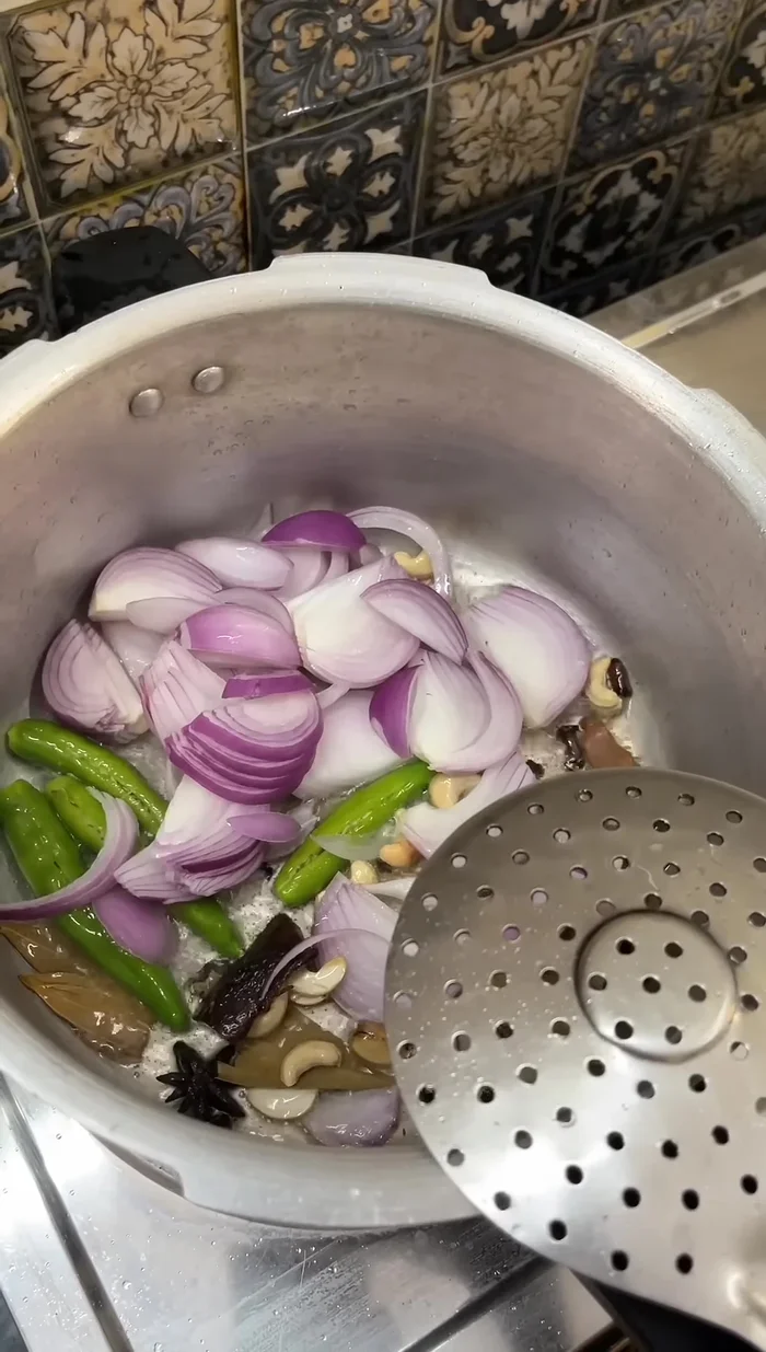 Add two finely chopped onions and fry well.