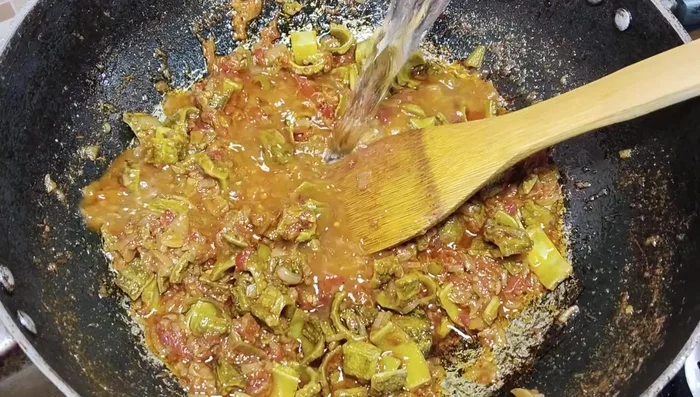 Add the boiled lentils and half a cup of water. Mix well and cook for 5-7 minutes on low heat.