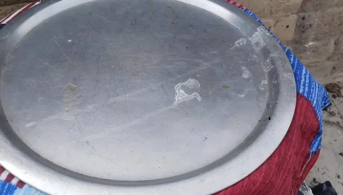 Cover the pot with a lid and place a weight on top to prevent steam from escaping. Cook for another 10-15 minutes.