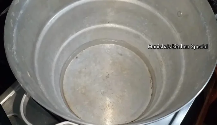 Add water to the idli steamer (1.5 cups).