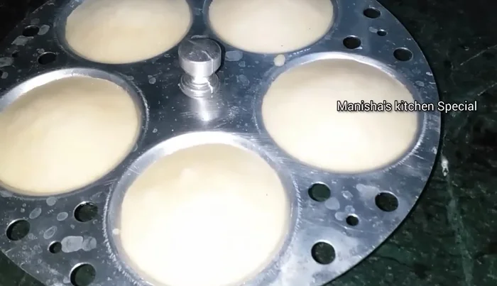 Let the idlis rest in the steamer for 5-10 minutes before removing them.