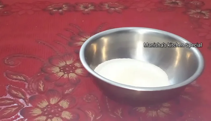 In a bowl, add 2 cups of fine semolina.