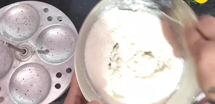 Add water to the batter if it's too thick after the resting period. The semolina will have absorbed some water.