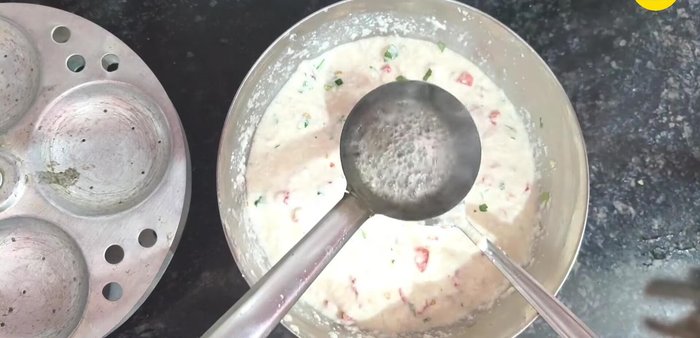Prepare the tempering: Heat oil, add mustard seeds, asafoetida, white sesame seeds, and curry leaves. Add this to the batter and mix well.