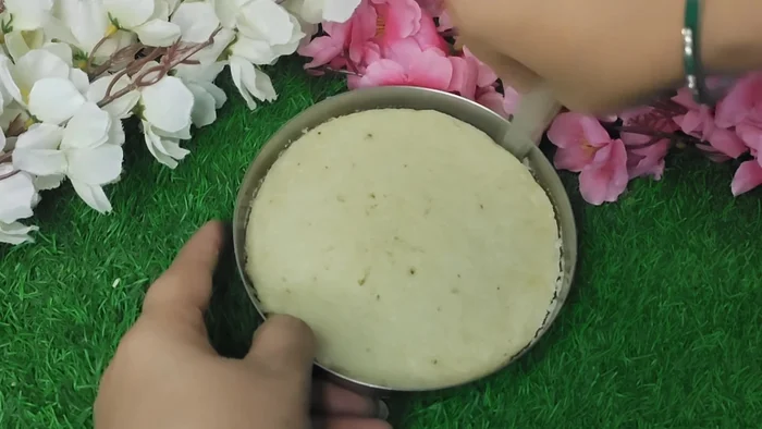 Once cooked, let the idlis cool slightly, then carefully remove them from the plates.