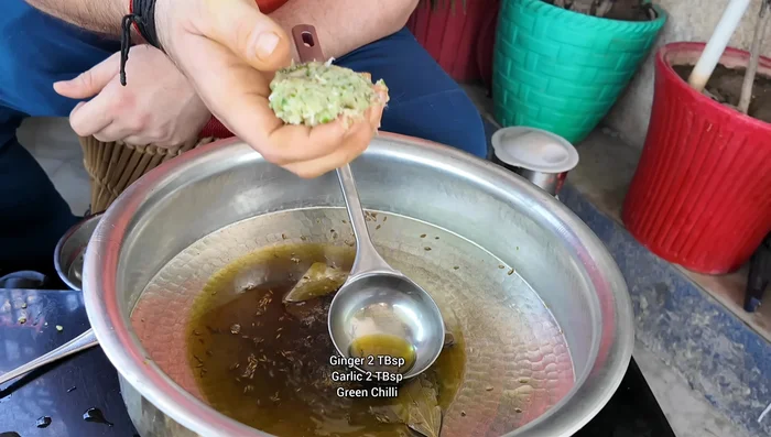 Add garlic, ginger, and green chilies. Fry for 1 minute.