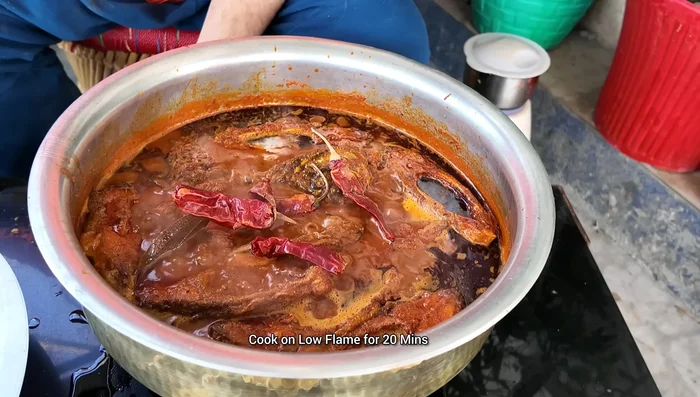 Add red chili, cover, and cook on high flame for 20-25 minutes.