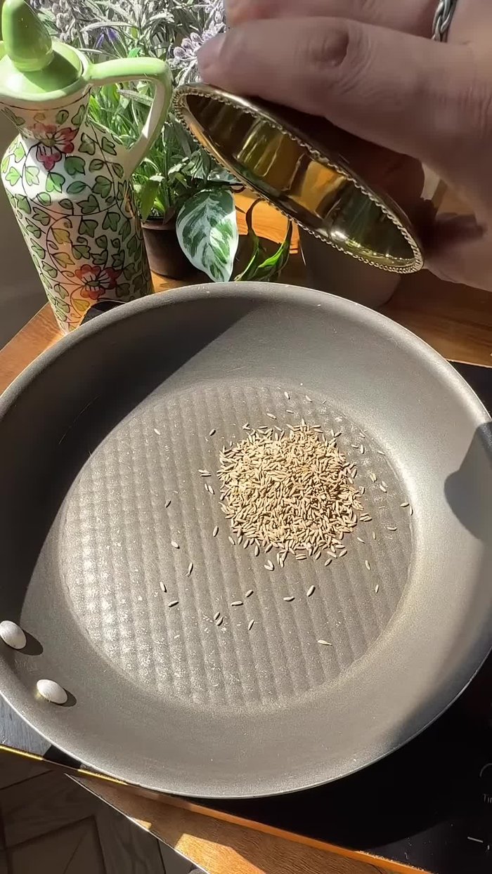 Lightly roast cumin and coriander seeds, then grind them into a powder.