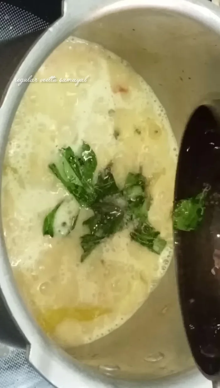 Pour the coconut milk mixture over the cooked green peas.