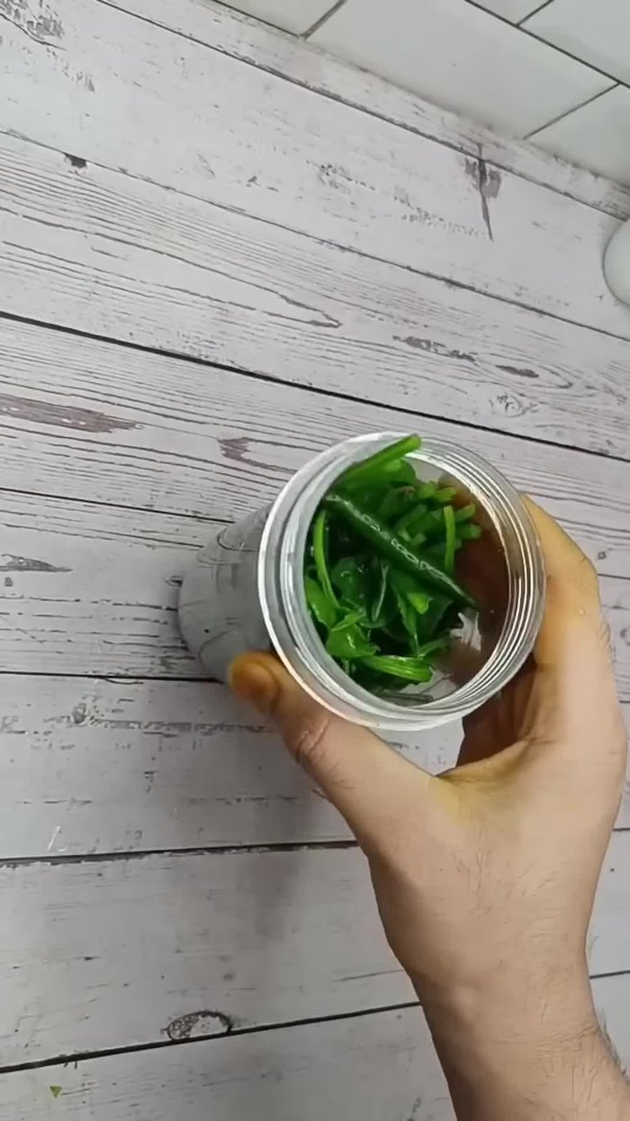 Grind the spinach, green chili, and a pinch of salt in a mixer to a smooth paste. Add a little celery and ghee for enhanced flavor.