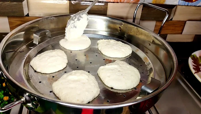 Steam the idlis for 8-10 minutes (216.44). Check for doneness by inserting a toothpick (244.439).