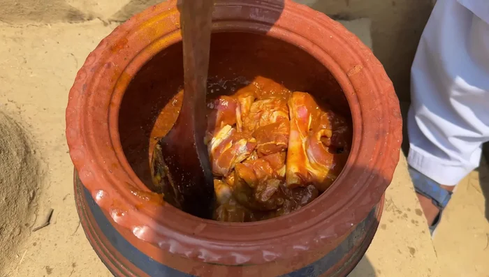 Add mutton and fry well until browned.