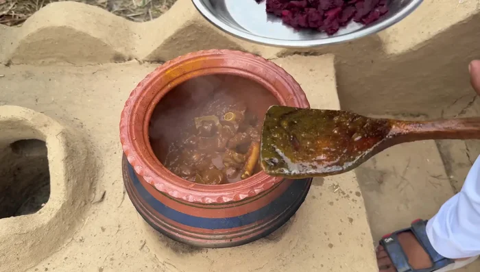 Add the mashed beetroot.