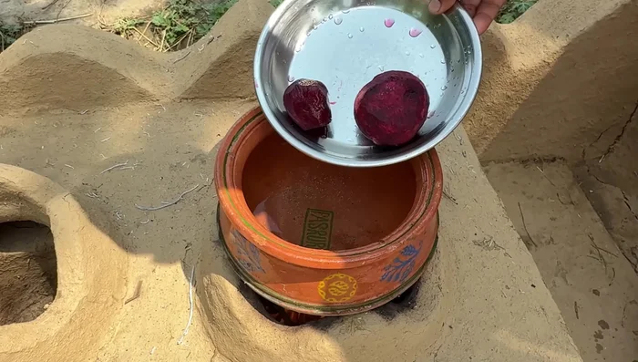 Boil peeled beetroots until tender.