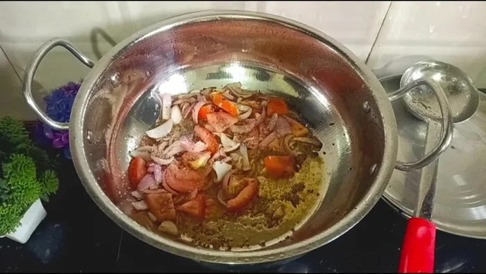 Add turmeric, red chili powder, coriander powder, and salt to the seasoning; fry until oil separates.