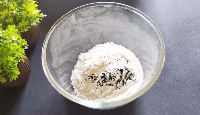 Add 1/2 teaspoon nigella seeds and 1/2 teaspoon crushed celery seeds.