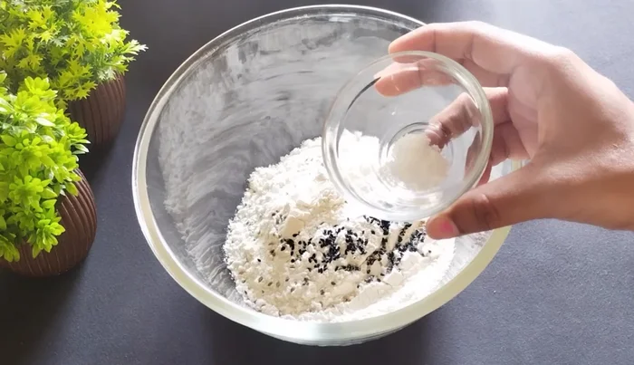 Add 1/2 teaspoon salt and mix dry ingredients well.