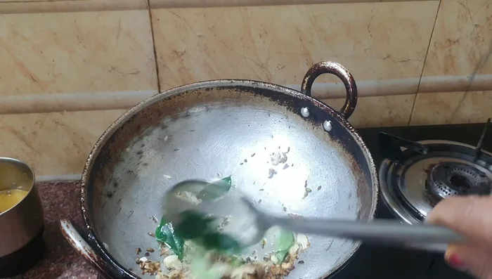 Add caraway seeds and powdered onions. Fry until onions are well cooked.