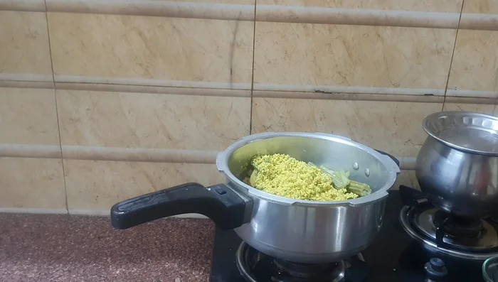 Add the spice paste to the cooked vegetables. Cook on medium flame until the spices are fragrant. (178.12)