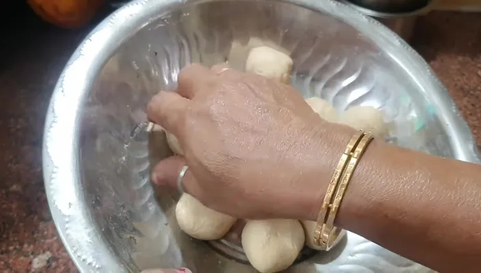 Heat a flat griddle or pan. Place the rolled dough on the hot surface.
